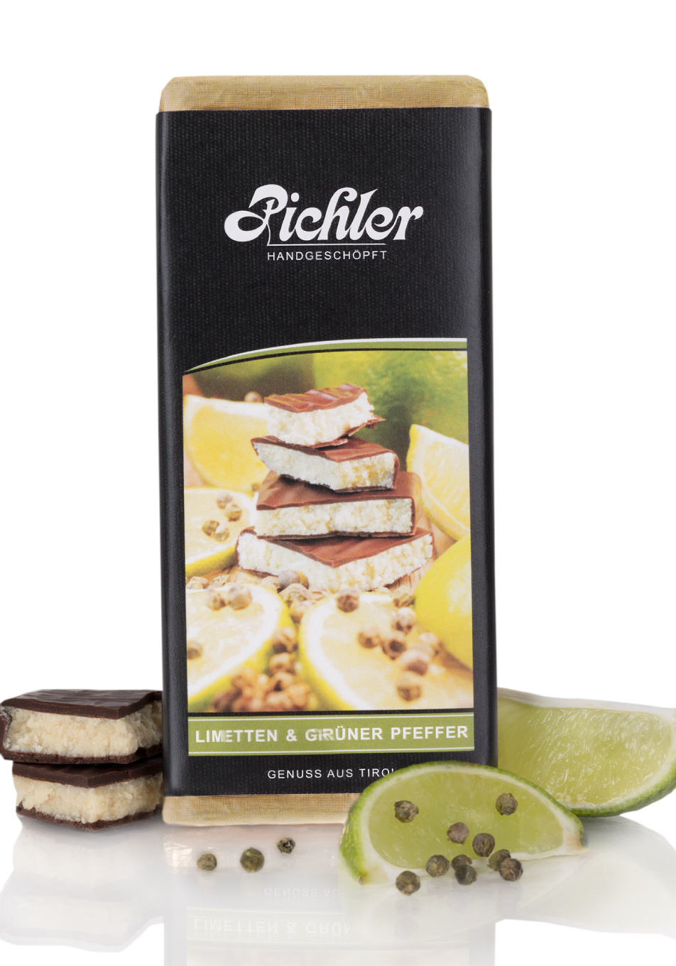 2. Professionelle Produktfotografie: Eine Schokoladentafel und Limettenscheiben auf einem Teller.